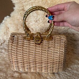 Vintage wicker bag with gold handle